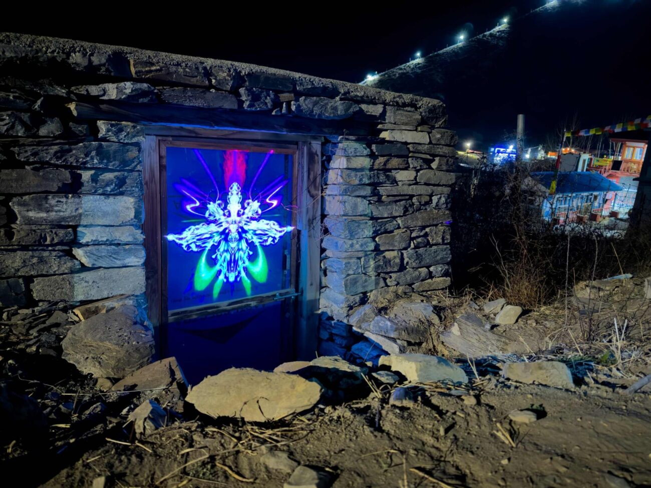emma x zhang art Manang Neon Bug Landscape mountain light installation, abstract symmetrical bug creature